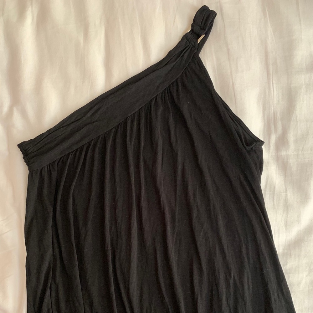 Women’s black one shoulder tank top.